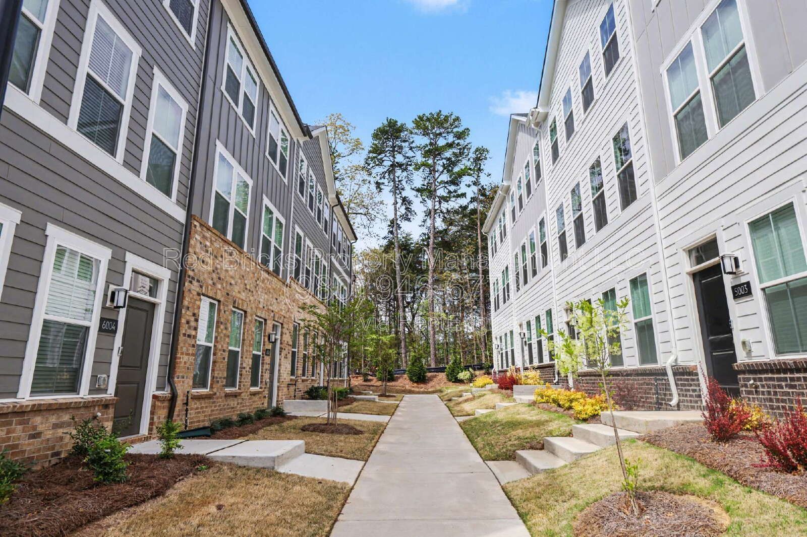 Modern 3-Story Townhome with Dual Suites & Garage – Move-In Ready! property image