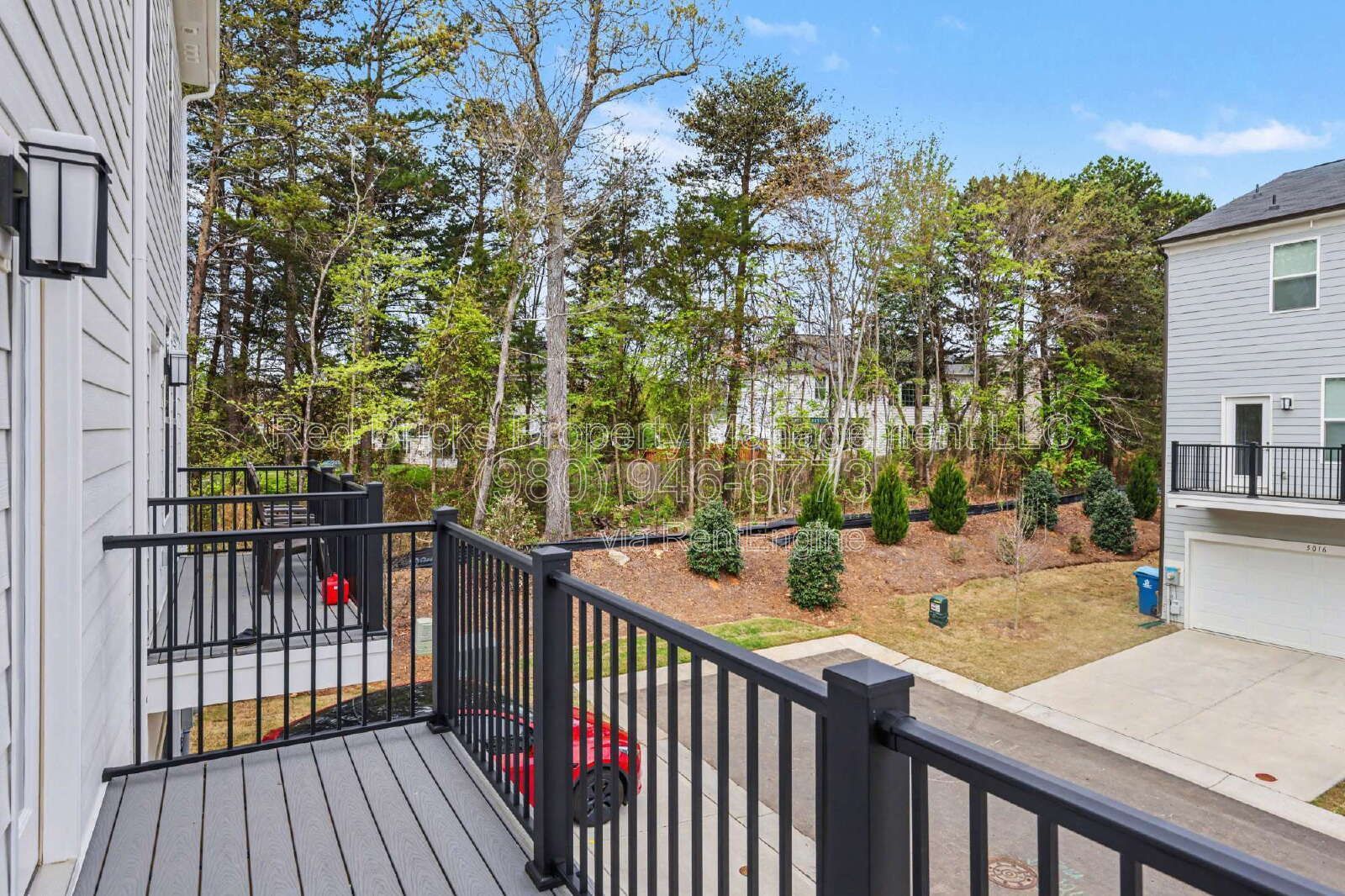 Modern 3-Story Townhome with Dual Suites & Garage – Move-In Ready! property image