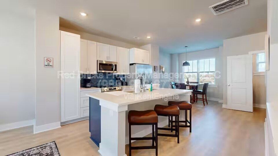 Modern 3-Story End Unit Near Uptown – Like New & Move-In Ready! property image